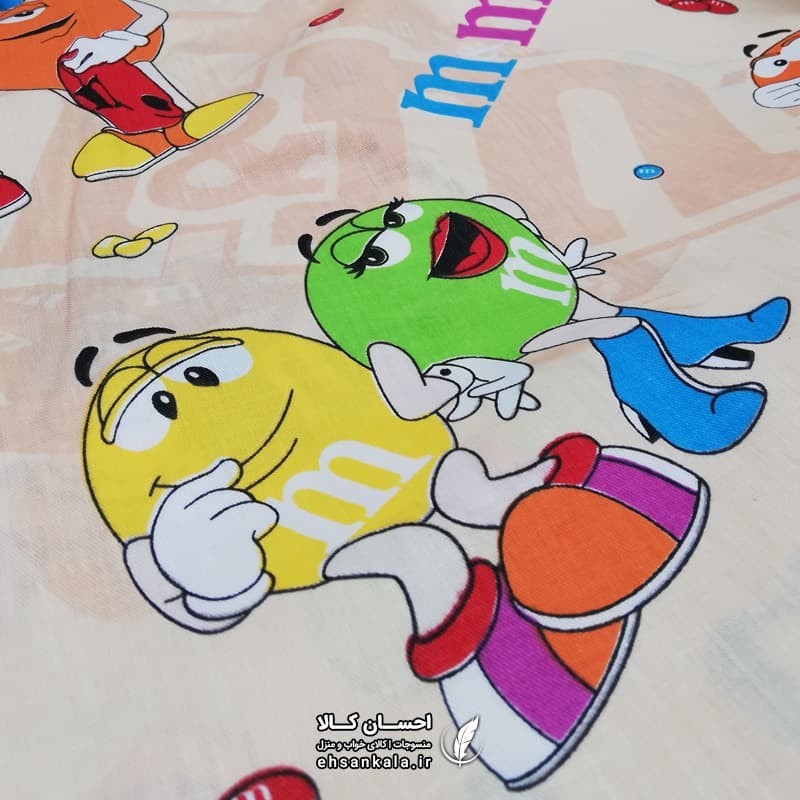 ملافه عروسکی طرح M&M ام اند ام